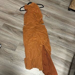 Purchased for a wedding, never worn